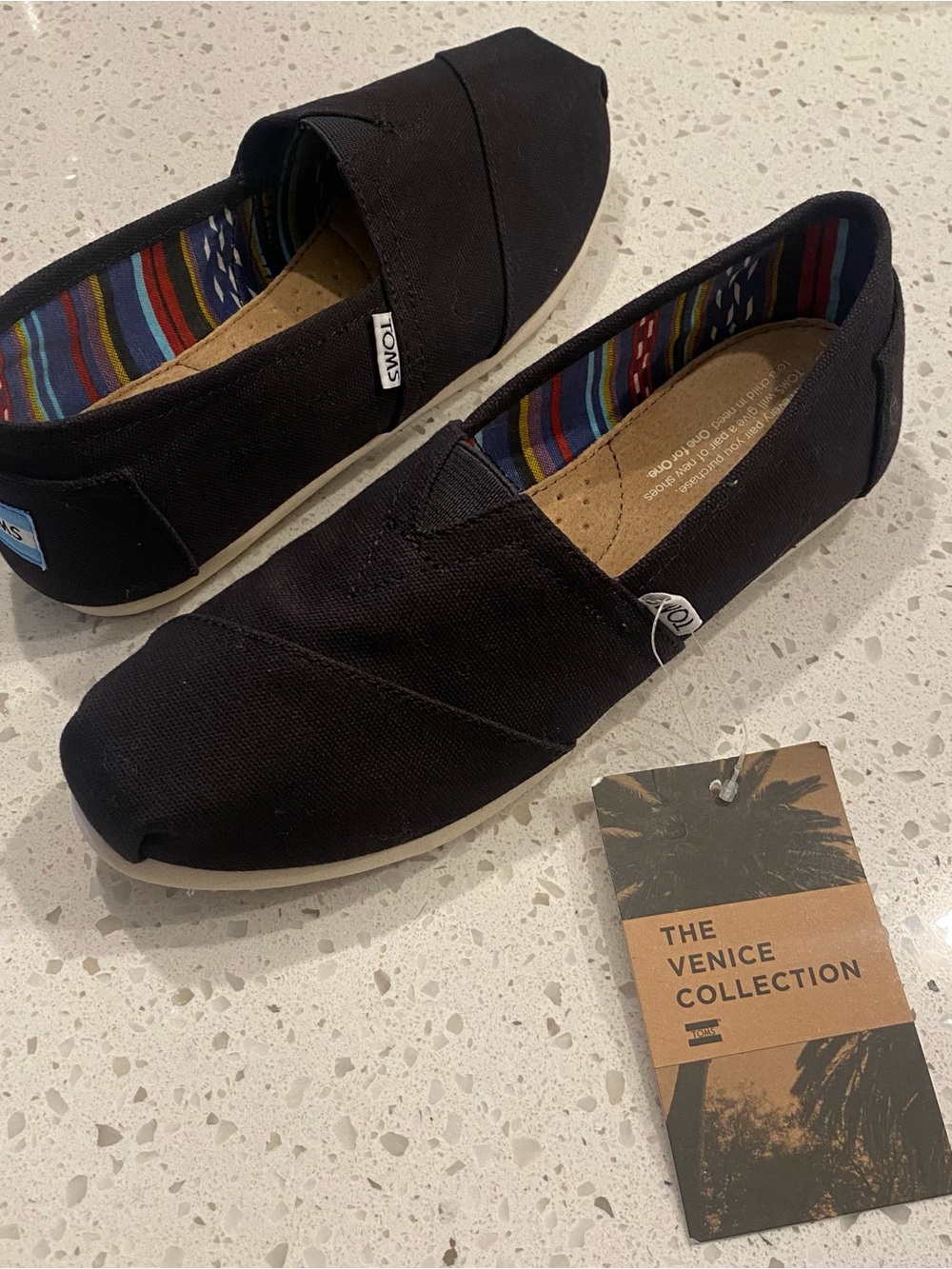 TOMS womens Classic Canvas Slip-On Shoes - Black